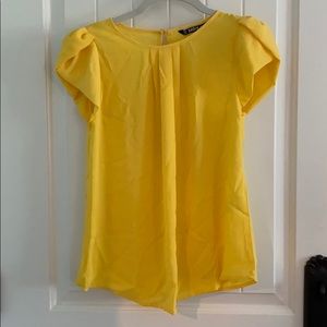 Yellow short sleeve blouse